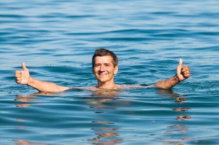 swimming manの写真素材