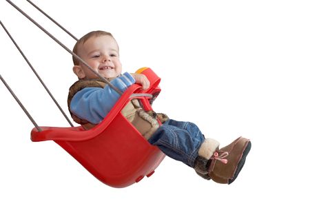 a baby is playing in a swing, isolatedの写真素材