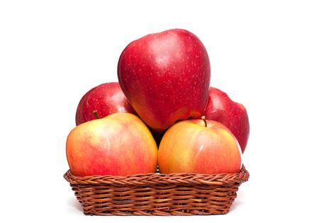 There are several red apples in the basketの写真素材