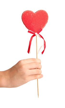 A hand presenting valentine on St. Valentine's Dayの写真素材