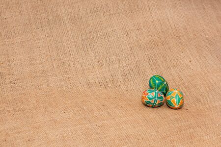 Three painted Easter eggs on the rugの写真素材