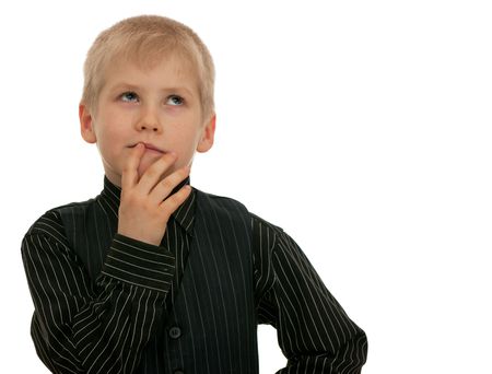 A portrait of a thoughtful boy; isolated on the white backgroundの写真素材