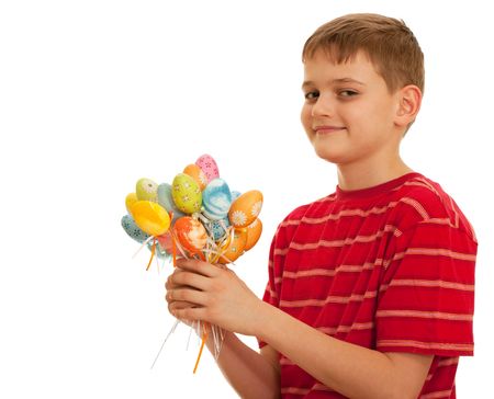 A kid is presenting a bunch of easter eggs; isolated on the white backgroundの写真素材