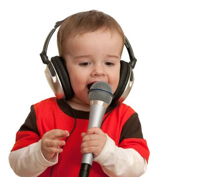 An expressive toddler is singing; isolated on the white backgroundの写真素材