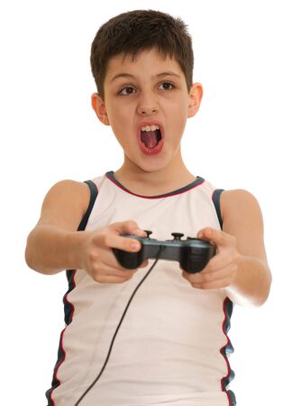 An ardor boy is playing a computer game; isolated on the white backgroundの写真素材