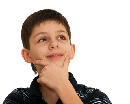 A boy with spiritual gesture is thinking; isolated on the white background の写真素材