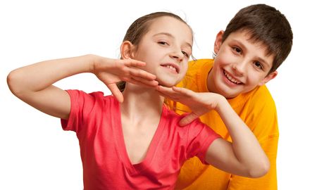 Two smiling children isolated on the white backgroundの写真素材