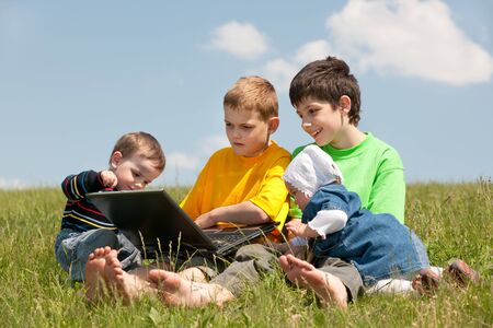 For children are playing in the meadowの写真素材