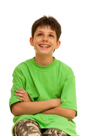 A laughing boy is looking up; isolated on the white backgroundの写真素材
