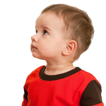 A portrait of a thoughtful toddler; isolated on the white backgroundの写真素材