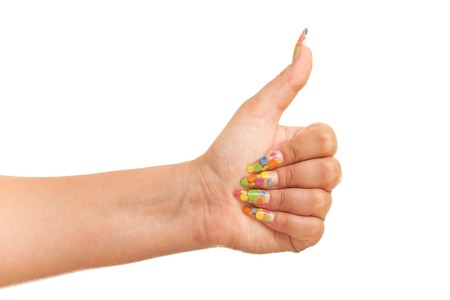Thumb up; isolated on the white backgroundの写真素材
