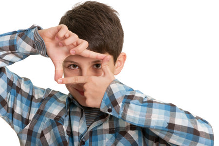 Closeup portrait of a handsome teenager in casual; isolated on the white background