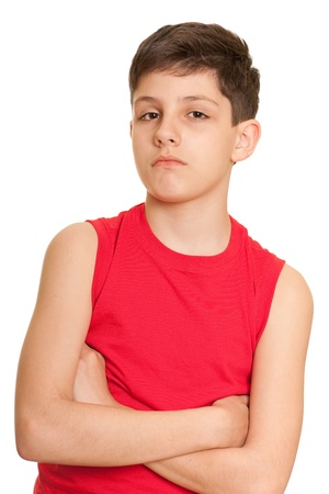 A portrait of a thoughtful handsome boy in red; isolated on the white backgroundの写真素材
