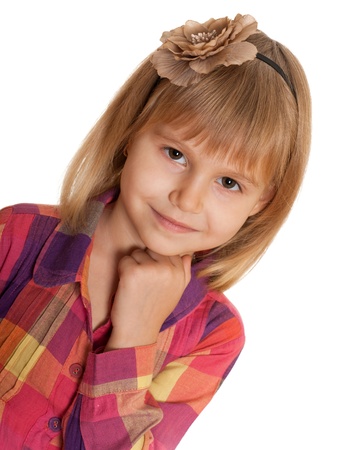 A closeup portrait of a lovely little girl ; isolated on the white backgroundの写真素材