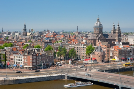 Amsterdam, Netherlands - May 28, 2012: Historic buildings in the center of Amsterdam. Having a population of more than 750,000  the countryのeditorial素材
