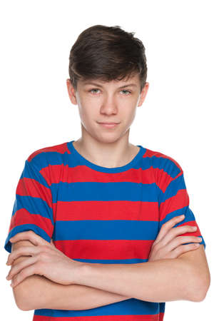 A portrait of a teenager boy on the white backgroundの写真素材