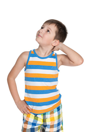 A portrait of a dreaming little boy on the white backgroundの写真素材