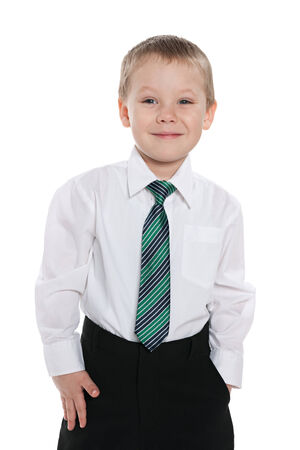 A portrait of a smiling preschool boy on the white backgroundの写真素材