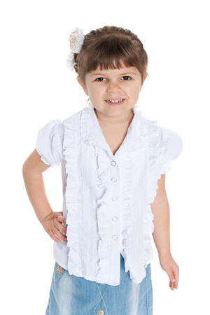 A portrait of a cheerful little girl against the white backgroundの写真素材