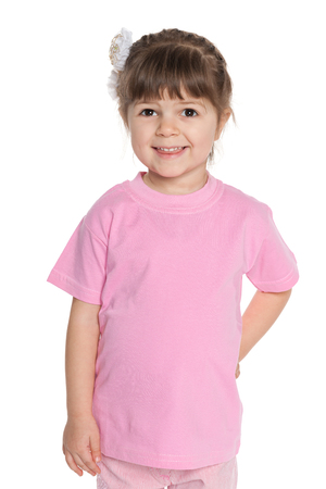 A portrait of a smiling little girl on the white backgroundの写真素材