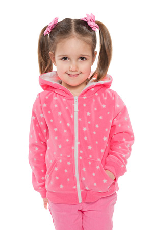 A portrait of a smiling preschool girl against the white backgroundの写真素材