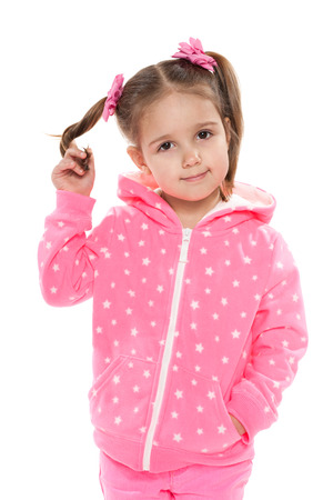 A portrait of a preschool girl against the white backgroundの写真素材