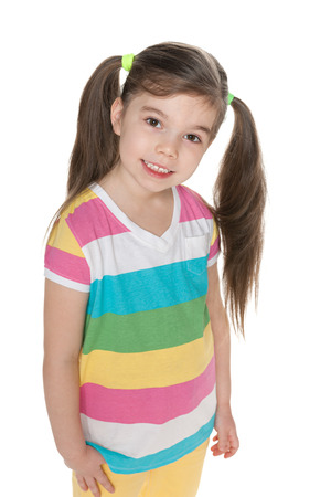 A closeup portrait of a little girl against the white backgroundの写真素材