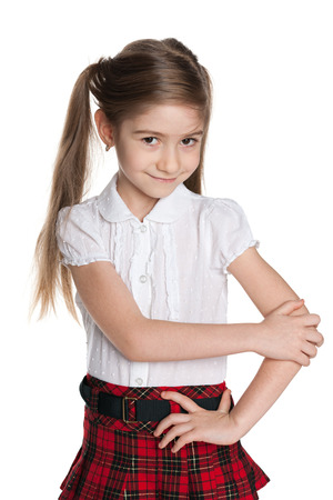 A cute little girl against the white backgroundの写真素材