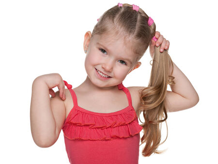 A portrait of a pretty little girl on the white backgroundの写真素材