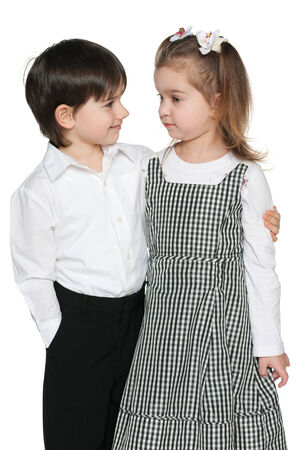 Portrait of two fashion children on the white backgroundの写真素材