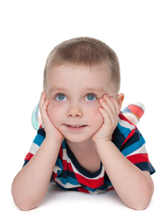 A portrait of a cute preschool boy on the white backgroundの写真素材
