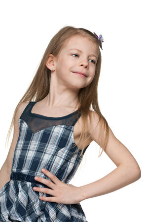 A portrait of a pretty pensive little girl on the white backgroundの写真素材