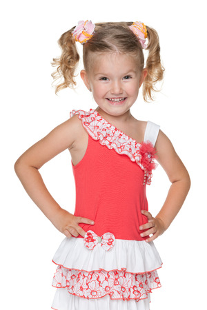 A portrait of a laughing pretty little girl on the white backgroundの写真素材