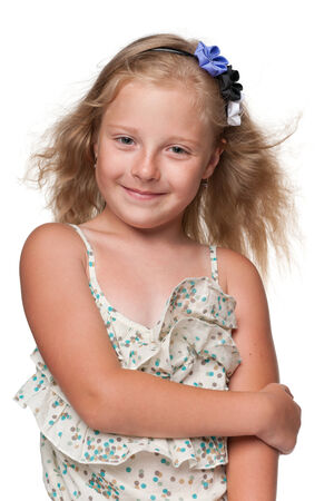 A portrait of a pretty young girl with flowing hair against the white backgroundの写真素材