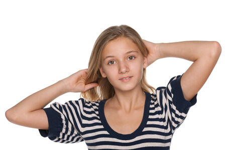 Portrait of an adorable preteen girl on the white の写真素材