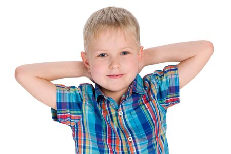 A little blond boy on the white の写真素材