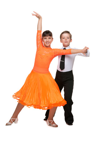 Children are dancing against the white の写真素材