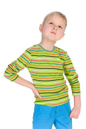 A portrait of a thoughtful little boy on the white backgroundの写真素材