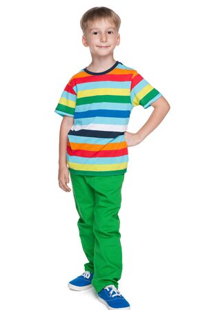 A smiling little boy in a striped shirt on the white backgroundの写真素材