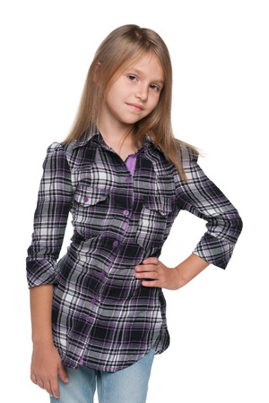 A portrait of a pensive young girl on the white backgroundの写真素材