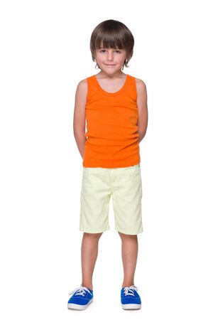 A portrait of a cute little boy against the white backgroundの写真素材