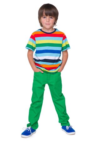 A portrait of a fashion smiling little boy in the green pantsの写真素材
