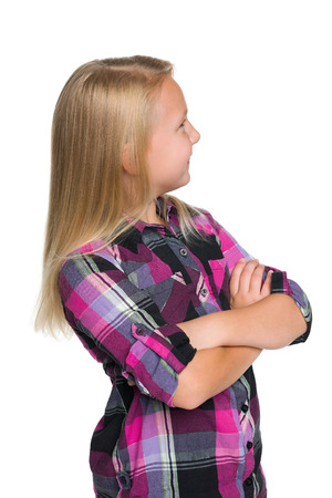 A portrait of a little girl from the back on the white backgroundの写真素材