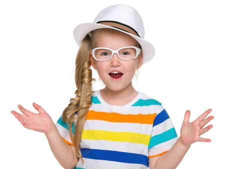 A portrait of a joyful little girl on the white backgroundの写真素材