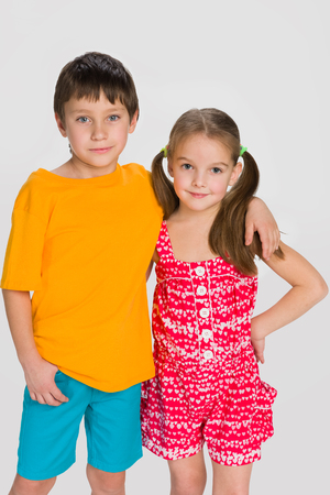 A portrait of two smiling fashion childrenの写真素材