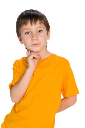 A handsome young boy imagines on the white backgroundの写真素材