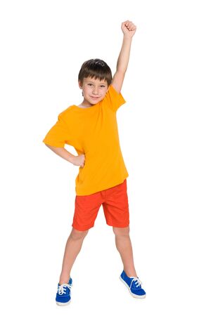 A portrait of a successful little boy on the white backgroundの写真素材