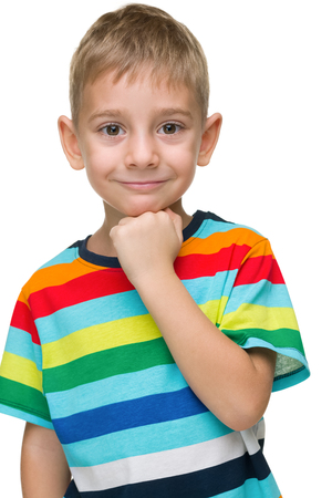 A portrait of a pensive preschool boy on the white backgroundの写真素材