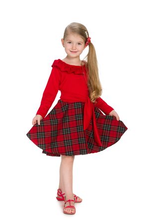 A portrait of a lovely little girl on the white backgroundの写真素材