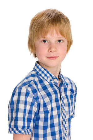 A portrait of a cute young boy on the white backgroundの写真素材